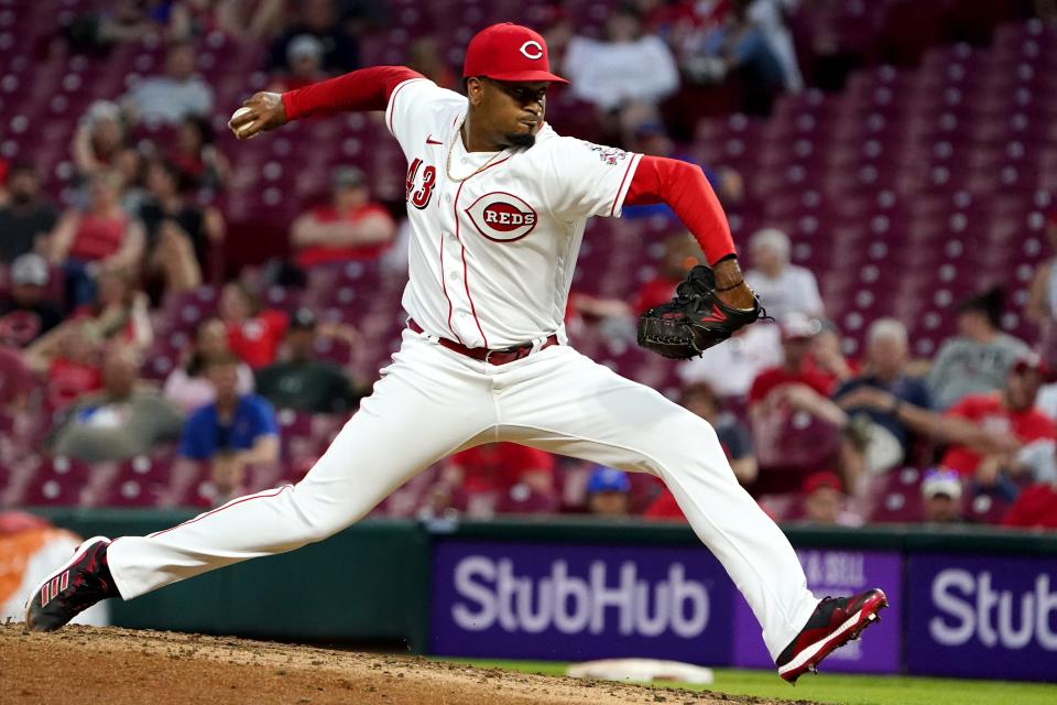 Cincinnati Reds relief pitcher Alexis Diaz (43) delivers in the seventh inning during a baseball game against the Chicago Cubs, Wednesday, May 25, 2022, at Great American Ball Park in Cincinnati. 