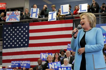 U.S. Democratic presidential candidate Hillary Clinton takes the stage at a "Get Out the Vote" campaign rally in Manchester, New Hampshire February 8, 2016. REUTERS/Brian Snyder