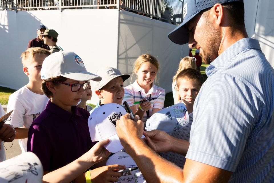 Christopher Petefish signs autographs after finishing the 18th hole during the Utah Championship, part of the PGA Korn Ferry Tour, at Oakridge Country Club in Farmington on Sunday, Aug. 6, 2023. Petefish finished second place with -23. | Megan Nielsen, Deseret News