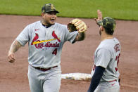 St. Louis Cardinals relief pitcher Yadier Molina (4) celebrates after getting the final out of a baseball game against the Pittsburgh Pirates in Pittsburgh, Sunday, May 22, 2022. (AP Photo/Gene J. Puskar)