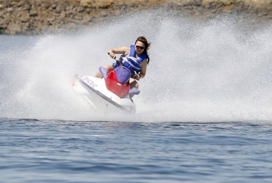 A jet skiier enjoys riding on the Columbia River.