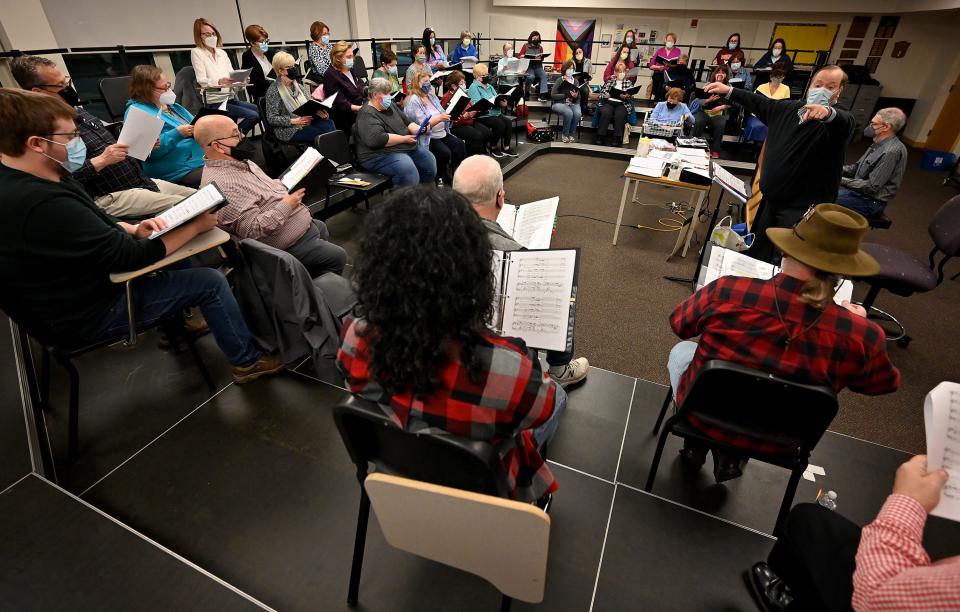 The Northborough Area Community Chorus rehearses for its May 1 concert in the Chorus Room at Algonquin Regional High School.