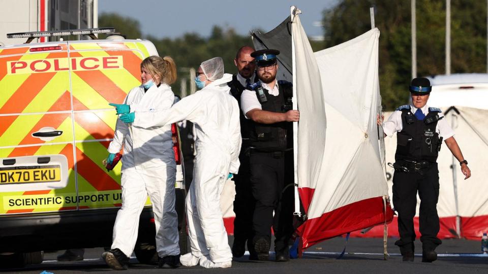 PHOTO: Police officers and forensic personnel put up a fence on Hart Street in Southport, northwest England, on July 29, 2024, following a knife attack. (Darren Staples/AFP via Getty Images)