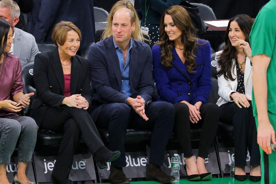 Britain's Prince William, Prince of Wales, and Britain's Catherine, Princess of Wales, with Emilia Fazzalari wife of Wyc Grousebeack (R), Governor-elect Maura Healey (2L) and mayor of Boston Michelle Wu (L) attend the National Basketball Association game between the seventeen-time World Champion Boston Celtics and the Miami Heat at TD Garden in downtown Boston,on November 30, 2022. (Photo by BRIAN SNYDER / POOL / AFP) (Photo by BRIAN SNYDER/POOL/AFP via Getty Images)