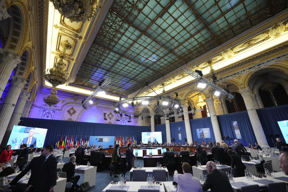 NATO Secretary-General Jens Stoltenberg addresses the attendees on the second day of the meeting of NATO Ministers of Foreign Affairs, in Bucharest, Romania, Wednesday, Nov. 30, 2022. (AP Photo/Andreea Alexandru)