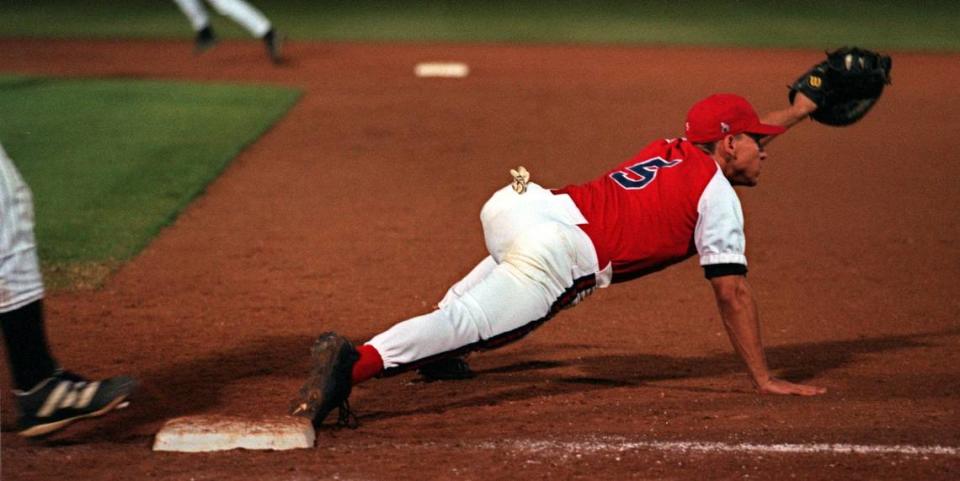 Dunedin first baseman D. DeSantis -- Gov. Ron DeSantis went by the initial D as a teenager -- had to stretch to catch the ball, but the first base umpire said he did not have his foot on the bag during the championship game of the 1997 Spring Tournament against Pasco.