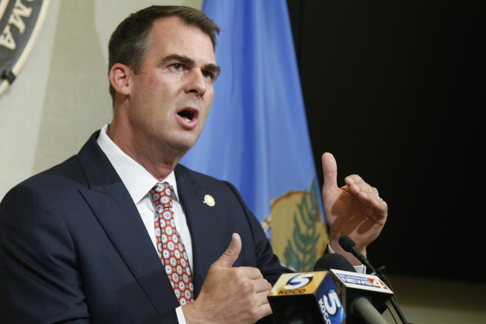 FILE - In this Thursday, July 9, 2020 file photo, Oklahoma Gov. Kevin Stitt speaks during a news conference in Oklahoma City. Oklahoma Gov. Kevin Stitt recommended three Native Americans and two Black Oklahomans as national heroes who should be considered for inclusion in a new National Garden of American Heroes. (AP Photo/Sue Ogrocki, File)