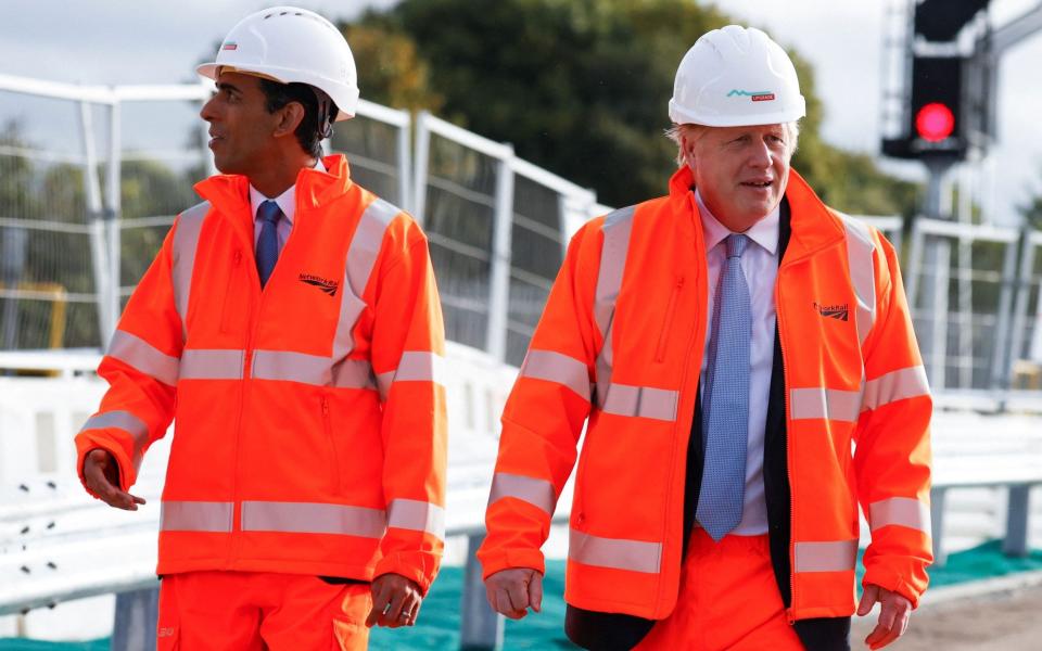 Boris Johnson and Rishi Sunak visit a construction site in Manchester - Phil Noble/AFP