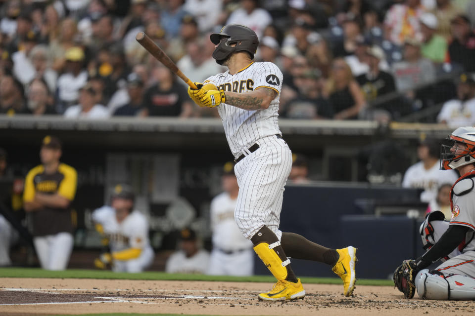 San Diego Padres' Gary Sanchez watches his grand slam during the first inning of a baseball game against the Baltimore Orioles, Tuesday, Aug. 15, 2023, in San Diego. (AP Photo/Gregory Bull)