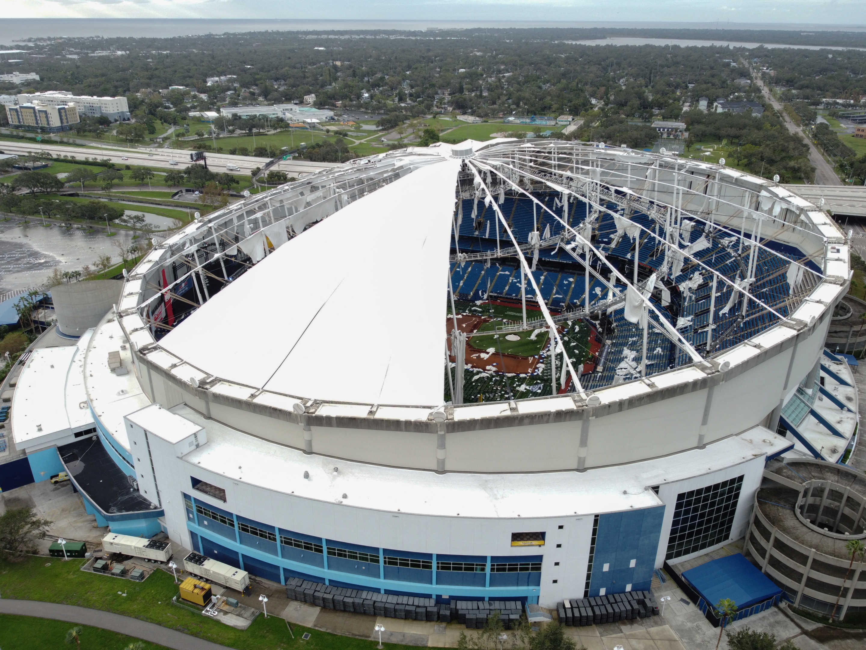 A drone image shows the dome of Tropicana Field ripped open by Hurricane Milton in St. Petersburg, Florida, on October 10, 2024. (Bryan R. Smith/AFP via Getty Images)