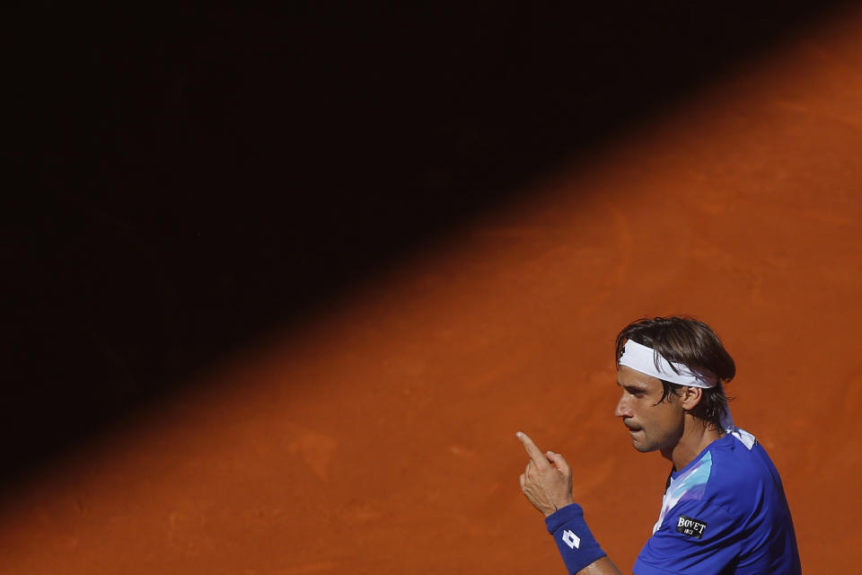David Ferrer from Spain gestures during a Madrid Open tennis tournament match against Albert Ramos from Spain, in Madrid, Spain, Tuesday, May 6, 2014. (AP Photo/Andres Kudacki)