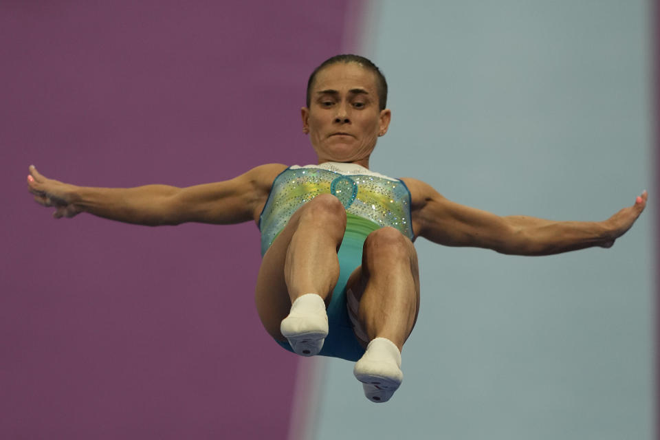 48 years old Uzbekistan's Oksana Chusovitina practices ahead of the Artistic Gymnastics Women's Vault event of the 19th Asian Games in Hangzhou, China, Thursday, Sept. 28, 2023. Oksana Chusovitina competed in her first Olympics in 1992 in Barcelona. Now 48, and she's not done yet despite the fact her competition is generations younger. Few were even born when she won Olympic gold. She finished fourth in the vault this week at the Asian Games and says she's aiming for next year's Olympics in Paris, when she would be 49.(AP Photo/Ng Han Guan)