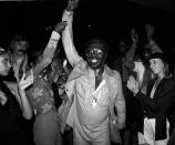 <p>Curtis Mayfield commands the crowd at Studio 54 during a night out in 1977. </p>