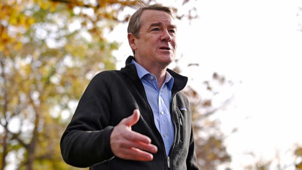 PHOTO: Sen. Michael Bennet answers questions from reporters after dropping off his ballot at Washington Park in Denver, Nov. 2, 2022. (Hyoung Chang/Denver Post via Getty Images)