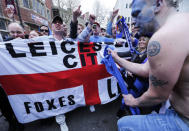 Leicester City fans celebrate in the street after their team's away soccer match against Manchester United, outside Hogarth's pub in Leicester, Britain May 1, 2016 REUTERS/Eddie Keogh