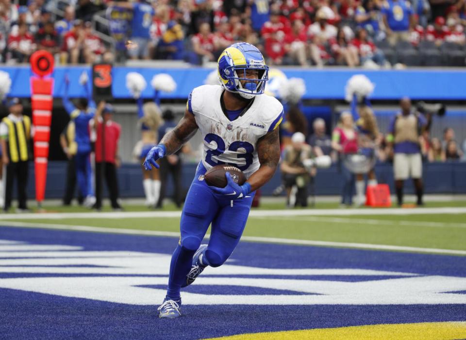 Rams running back Kyren Williams runs through the end zone after scoring against the 49ers.