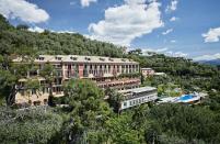 <p>First opened in 1901, the <a href="https://www.belmond.com/hotels/europe/italy/portofino/belmond-hotel-splendido/" rel="nofollow noopener" target="_blank" data-ylk="slk:Belmond Hotel Splendido;elm:context_link;itc:0;sec:content-canvas" class="link ">Belmond Hotel Splendido</a> is an iconic hotel in Italy and has hosted countless celebrities and luminaries, from the Duke and Duchess of Windsor to Elizabeth Taylor and Madonna. Spread across a 16th-century building that was originally a monastery, the hotel boasts sprawling suites, a saltwater pool overlooking the Bay of Portofino, and perfectly manicured gardens. The property’s two restaurants serve sophisticated takes on Ligurian specialties, like locally caught seafood and homemade pasta, and the hotel’s bar features lively nightly performances by piano man Vladimir, who serenades guests with classic Italian tunes.</p>