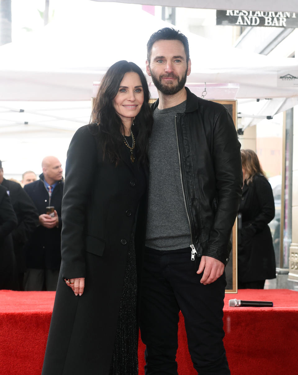 Courteney Cox and Johnny McDaid at the star ceremony where Courteney Cox is honored with a star on the Hollywood Walk of Fame on February 27, 2023 in Los Angeles, California. (Photo by Gilbert Flores/Variety via Getty Images)