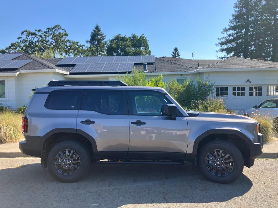 A Toyota Land Cruiser is parked outside a home in Silicon Valley