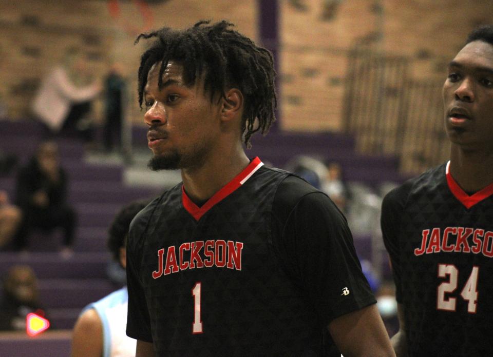 Jackson forwards James Morrow (1) and Stephon Payne (24) look on during a break in play during the 2022 Gateway Conference basketball tournament.