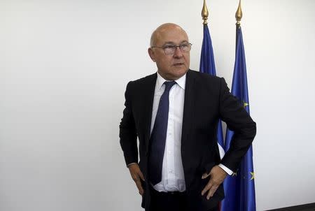 French Finance Minister Michel Sapin arrives to a press conference during the 2015 IMF/World Bank Annual Meetings in Lima, Peru, October 8, 2015. REUTERS/Paco Chuquiure