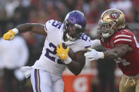 Minnesota Vikings running back Alexander Mattison (25) runs against San Francisco 49ers middle linebacker Fred Warner during the first half of an NFL football game in Santa Clara, Calif., Sunday, Nov. 28, 2021. (AP Photo/Jed Jacobsohn)