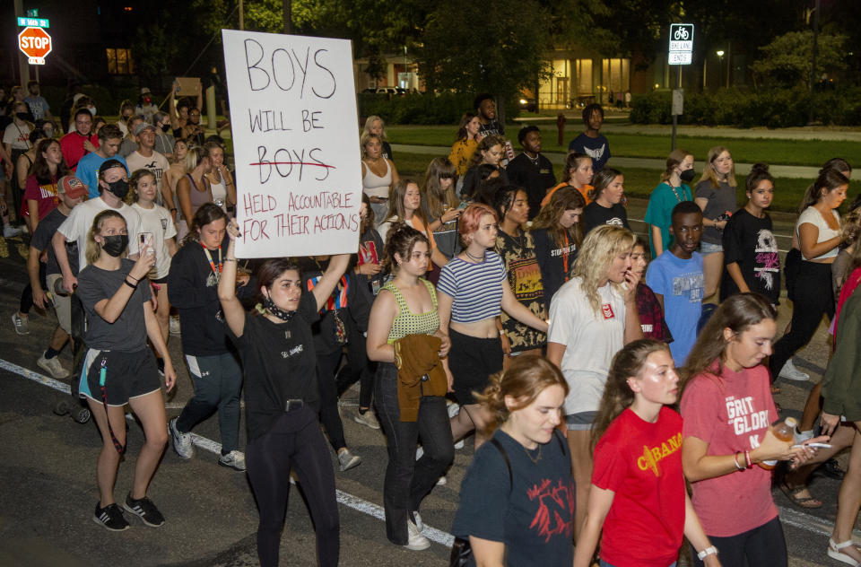 Protesters march around the campus on Wednesday, Aug. 25, 2021, in Lincoln, Neb., in response to the alleged sexual assault at the Phi Gamma Delta fraternity house. Students have protested since Aug. 24 after a student reported being sexually assaulted at the Phi Gamma Delta fraternity house. University of Nebraska-Lincoln Chancellor Ronnie Green temporarily suspended the Fiji house on Aug. 25. (Francis Gardler/Lincoln Journal Star via AP)