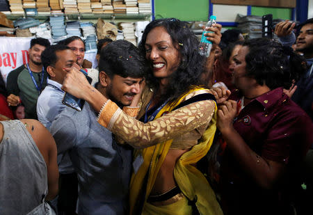 People belonging to the lesbian, gay, bisexual and transgender (LGBT) community celebrate after the Supreme Court's verdict of decriminalizing gay sex and revocation of the Section 377 law, at an NGO in Mumbai, India, September 6, 2018. REUTERS/Francis Mascarenhas