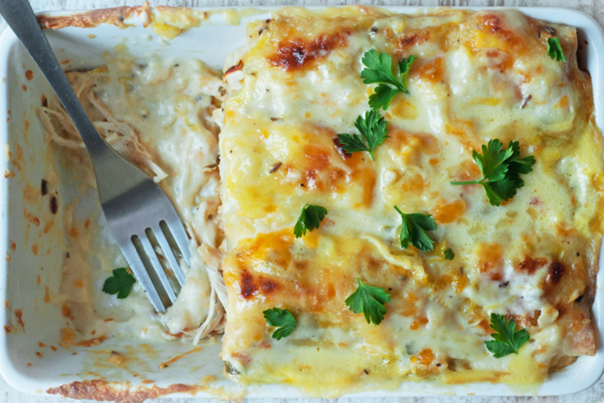 <p>Skinny Ms.</p><p>These skinny chicken enchiladas are sure to be a hit with your whole family!</p><p><strong>Get the recipe: <a href="https://skinnyms.com/skinny-white-chicken-enchiladas-recipe-3/" rel="nofollow noopener" target="_blank" data-ylk="slk:Skinny White Chicken Enchiladas;elm:context_link;itc:0;sec:content-canvas" class="link rapid-noclick-resp">Skinny White Chicken Enchiladas</a></strong></p>