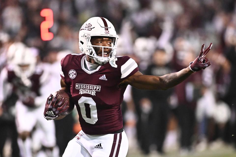 Rara Thomas, while at Mississippi State during the 2022 season, gestures during a touchdown run against Auburn. ( Matt Bush, USA TODAY Sports)