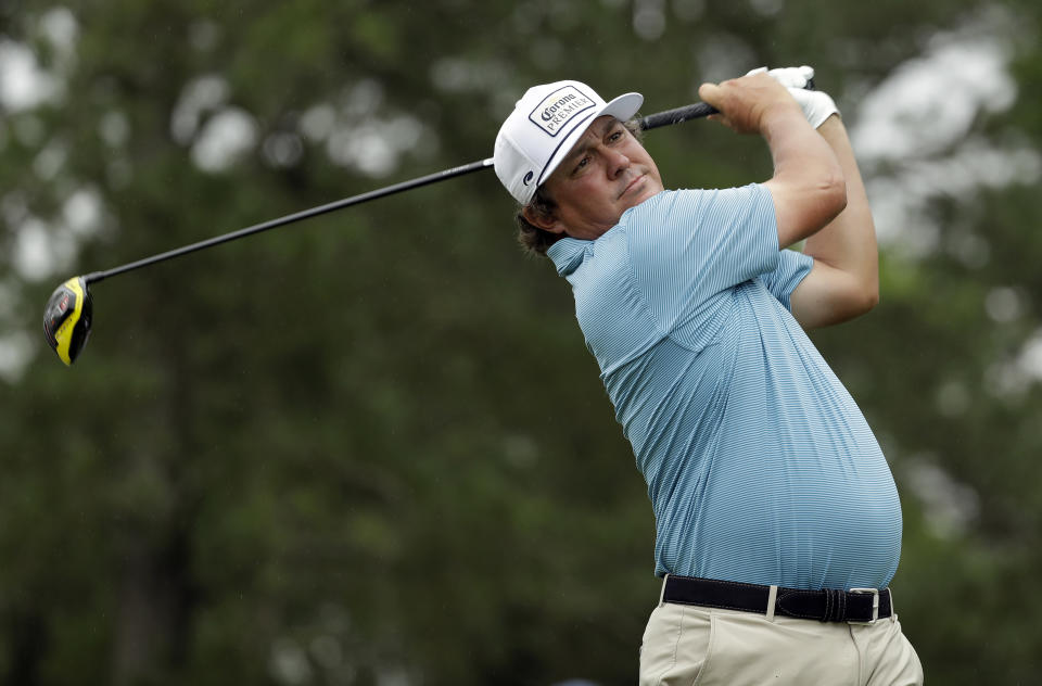 Jason Dufner watches his tee shot on the third hole during the final round of the Wells Fargo Championship golf tournament at Quail Hollow Club in Charlotte, N.C., Sunday, May 5, 2019. (AP Photo/Chuck Burton)