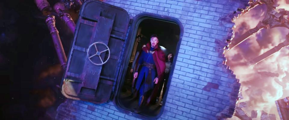 Doctor Strange coming out of a brick building