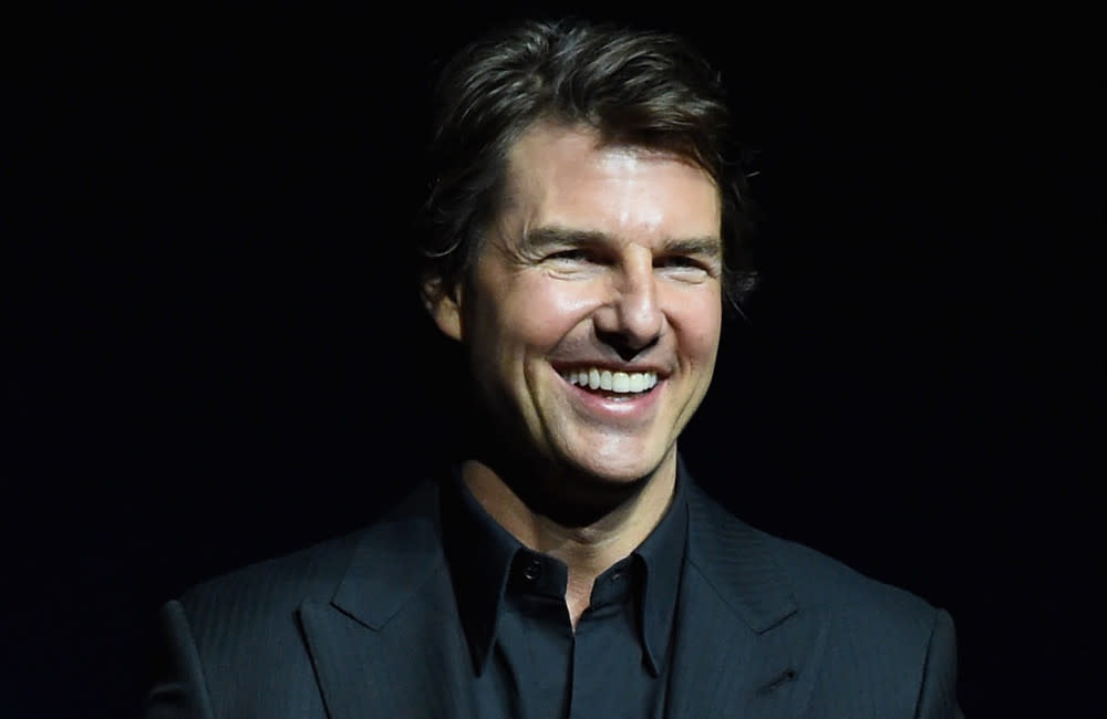 Tom Cruise reportedly landed his unemployed film crew new jobs shooting a music video for 1980s pop star Rick Astley credit:Bang Showbiz