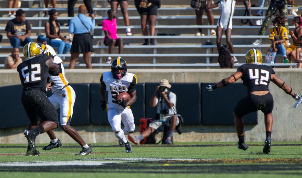 University of Arkansa-Pine Bluff running back Kayvon Britten (33) finds a break in the defensive line to take advantage of during the second quarter on October 09, 2021. 