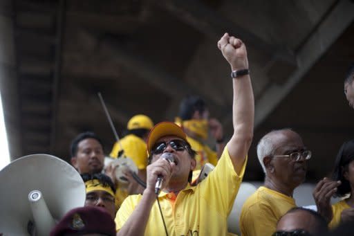 Malaysian opposition leader Anwar Ibrahim addresses an anti-government rally in Kuala Lumpur, last month. Anwar was charged in a Kuala Lumpur court on Tuesday with violating a contentious new law on public assemblies, according to his lawyer