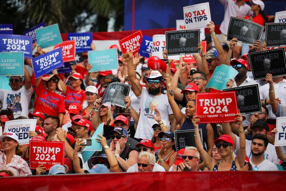 Supporters of Republican presidential candidate and former U.S. President Donald Trump attend a campaign rally at Trump's golf resort in Doral, Florida, U.S., July 9, 2024. REUTERS/Brian Snyder