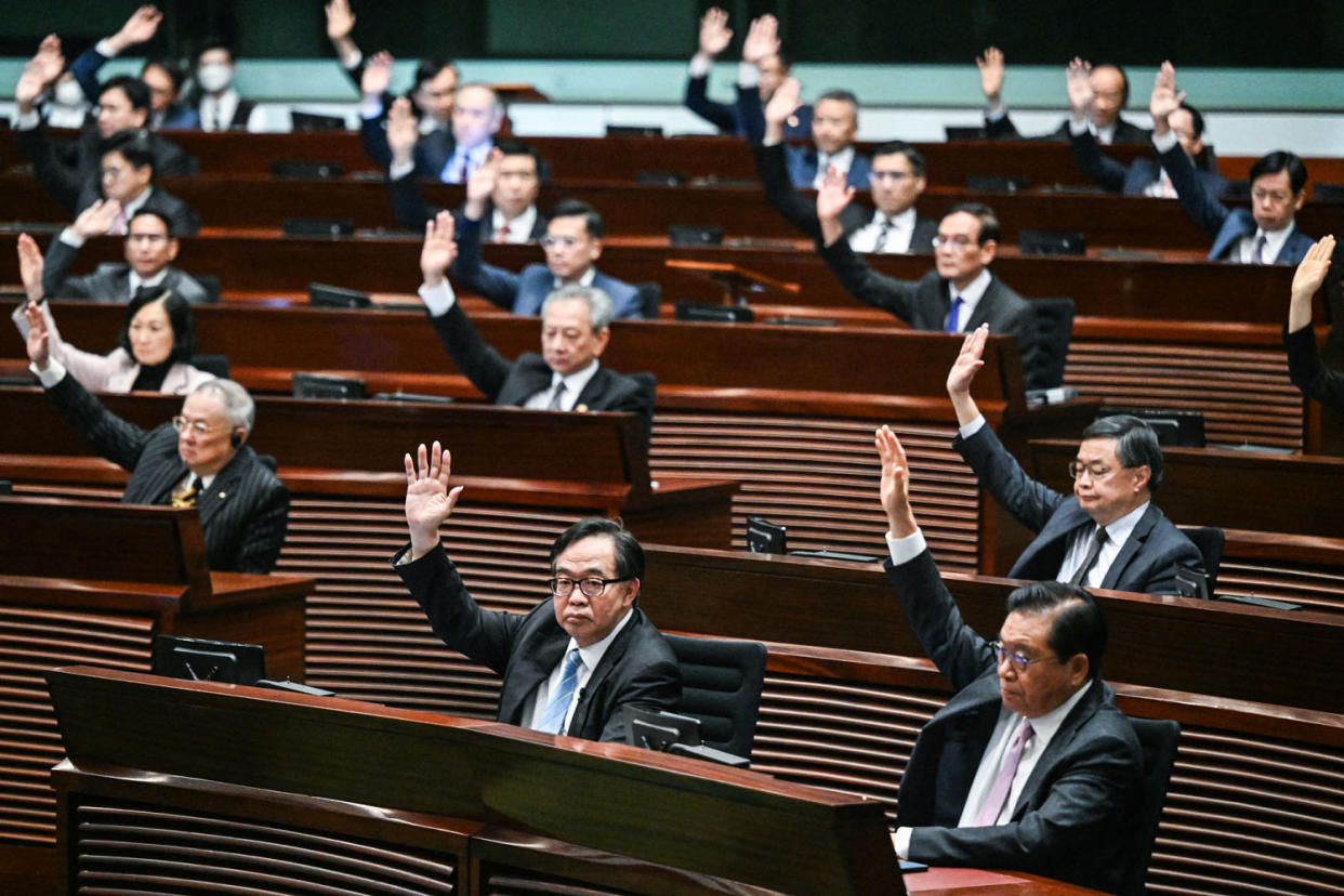 Lawmakers vote for Article 23 in the chamber of the Legislative Council (Peter Parks / AFP - Getty Images file)