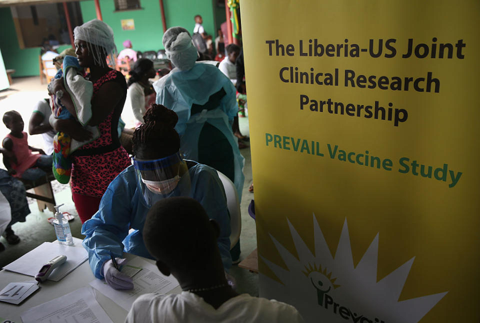 A nurse speaks with a volunteer for the Ebola vaccine trials, which were launched at Redemption Hospital, formerly an Ebola holding center, on February 2, 2015 in Monrovia, Liberia. Twelve people were given injections on the first day, out of a planned 27,000 people in the Monrovia area. The clinical research study is being conducted jointly by the U.S. National Institutes of Health (NIH), and the Liberian Ministry of Health. | John Moore—Getty Images