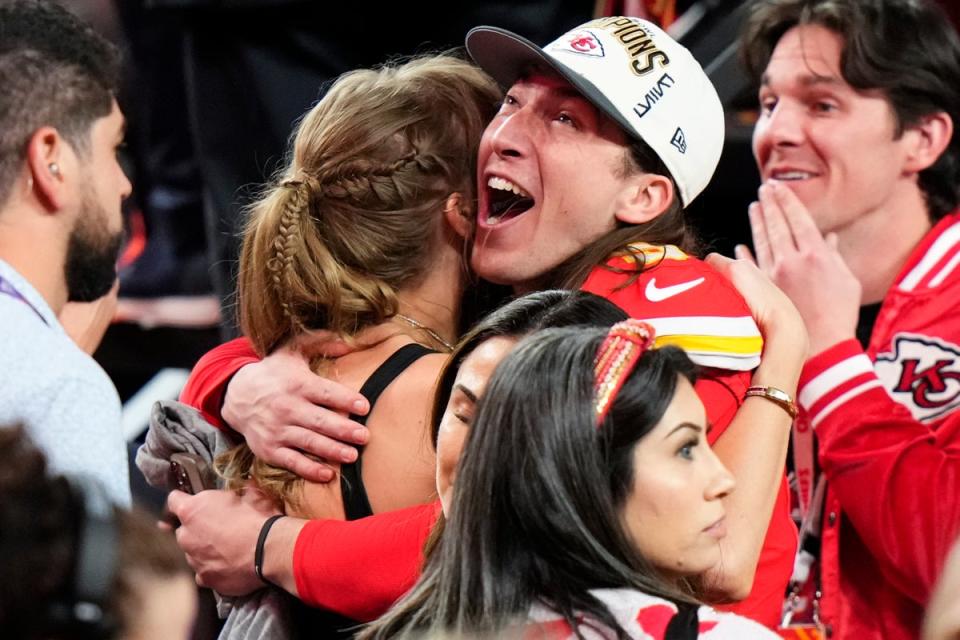 Kansas City Chiefs kicker Harrison Butker embraces Taylor Swift after the NFL Super Bowl 58 against the San Francisco 49ers (AP)