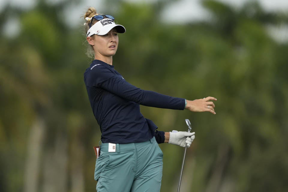 Nelly Korda watches her shot from the 18th fairway during the first round of the LPGA CME Group Tour Championship golf tournament, Thursday, Nov. 16, 2023, in Naples, Fla. (AP Photo/Lynne Sladky)