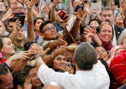 <p>President Barack Obama shakes hands with soldiers and families of the base personnel during his visits at Iwakuni Marine Corps Air Station, enroute to Hiroshima, Japan May 27, 2016. (Photo: Carlos Barria/Reuters) </p>