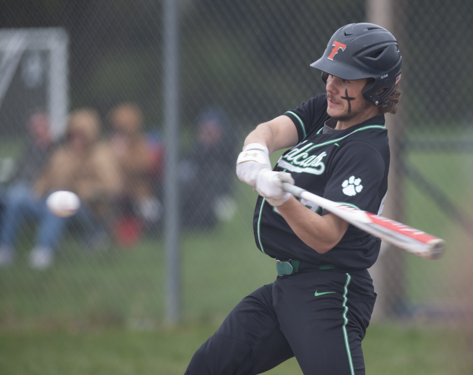 Austin Constantine takes a swing.