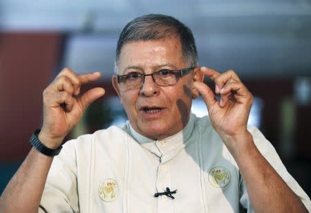 Leading FARC negotiator Rodrigo Granda gestures while speaking to Reuters in Havana, Cuba, in this August 18, 2015 file photo. REUTERS/Stringer/Files