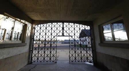 The main gate of the former concentration camp in Dachau near Munich is seen without the stolen door with the Nazi slogan "Arbeit macht frei" (Work sets you free), November 3, 2014. REUTERS/Michael Dalder