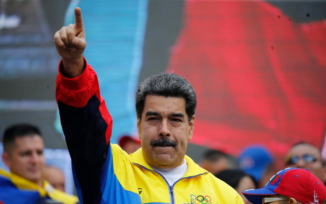 Venezuela's President Nicolas Maduro at a rally in Caracas condemning the economic sanctions imposed by the US - Ariana Cubillos/AP