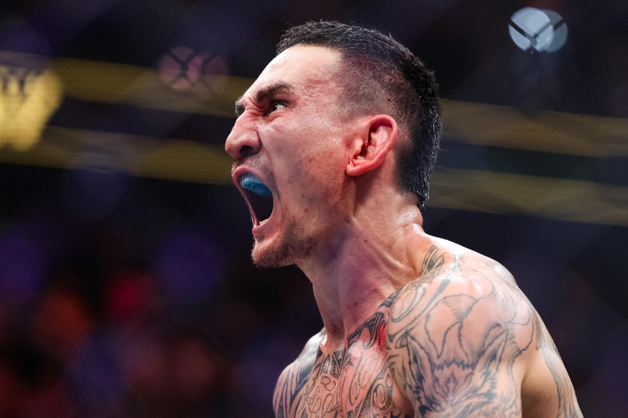 LAS VEGAS, NEVADA - APRIL 13: Max Holloway reacts to defating Justin Gaethje in their BMF title fight at T-Mobile Arena on April 13, 2024 in Las Vegas, Nevada. (Photo by Carmen Mandato/Getty Images)