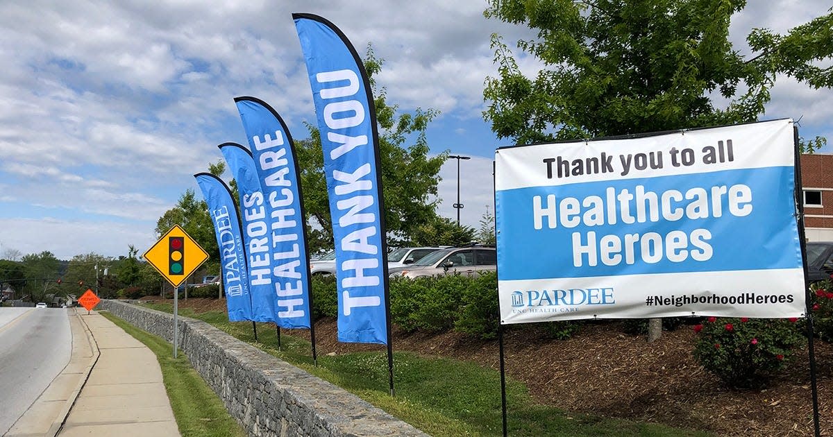 A sign outside of Pardee Hospital in Hendersonville refers to healthcare workers are heroes.