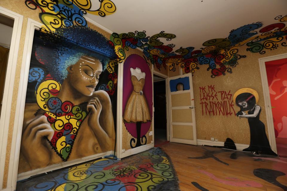 A living room painted by Brazilian street artist Loiola is seen at the street art project tower "Paris Tour 13" in Paris