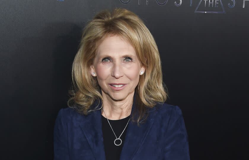 FILE- In this March 29, 2017, file photo, Shari Redstone attends the premiere of "Ghost in the Shell" at AMC Loews Lincoln Square in New York. CBS is suing its controlling shareholder as part of its long-running attempt to avoid a combination with Viacom. The majority shareholder of both companies is National Amusements. The holding company is run by Shari Redstone, the daughter of media mogul Sumner Redstone. (Photo by Evan Agostini/Invision/AP, File)