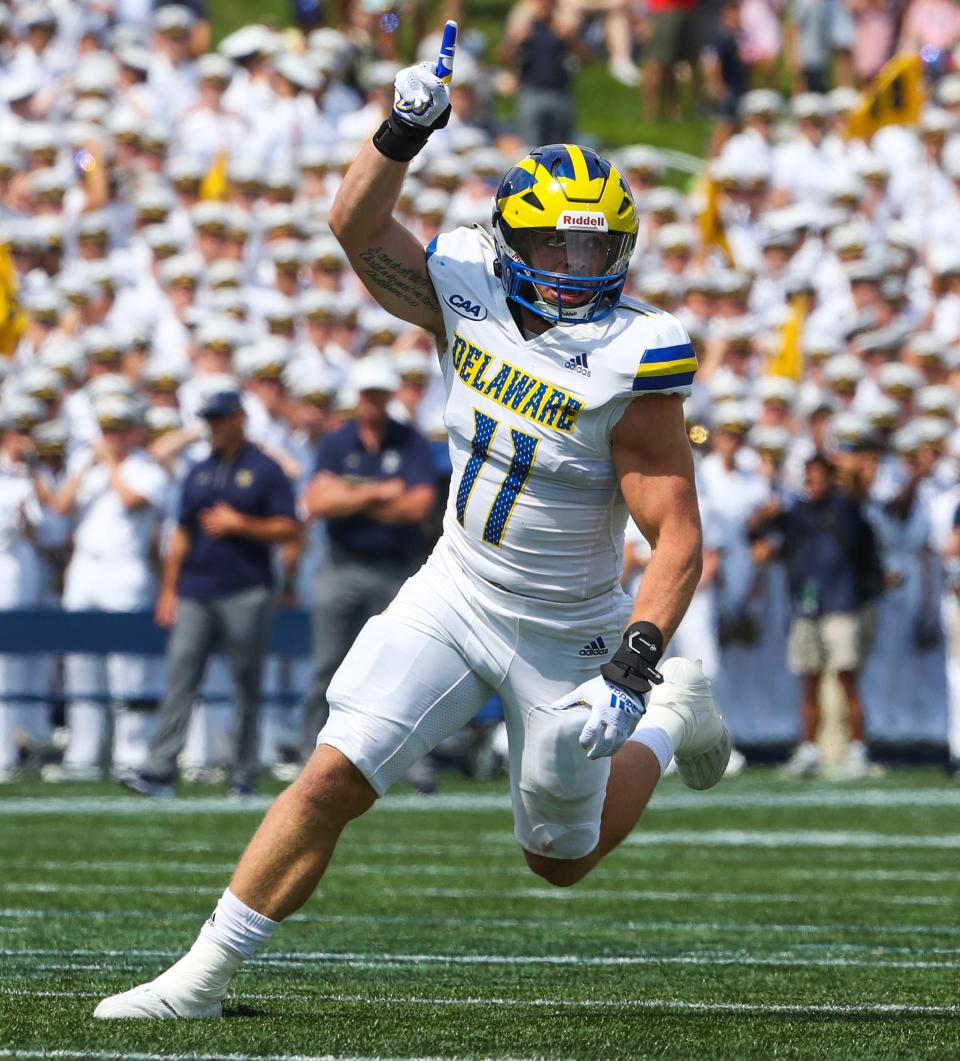 Delaware's Liam Trainer reacts as his defense comes up with a fumble recovery early in the first quarter of the Blue Hens' 14-7 win at Navy-Marine Corps Memorial Stadium in Annapolis, Md., Saturday, Sept. 3, 2022.